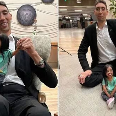 একফ্রেমে বিশ্বের সবচেয়ে লম্বা পুরুষ ও খর্বাকার নারী